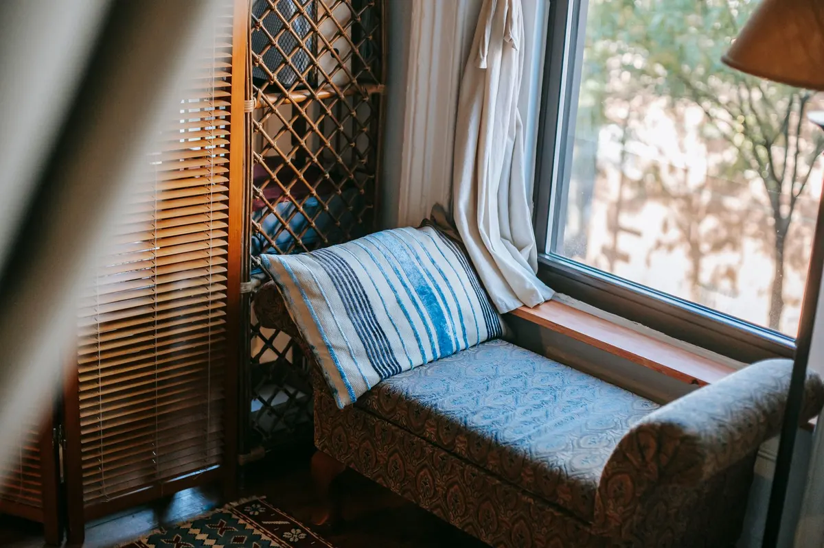 cozy living room reading nook with fluted floor lamp
