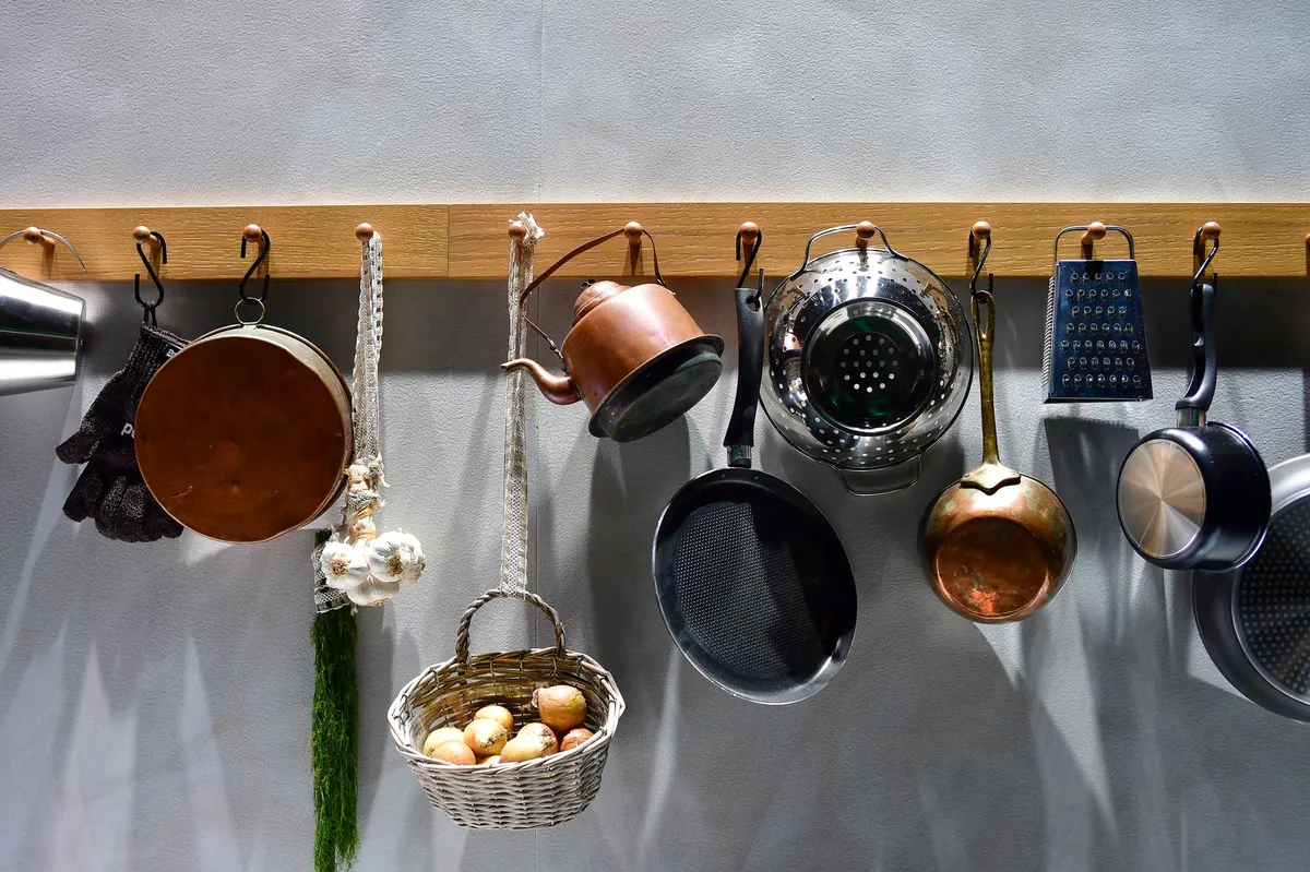thrifted wooden wall rack before sanding home project