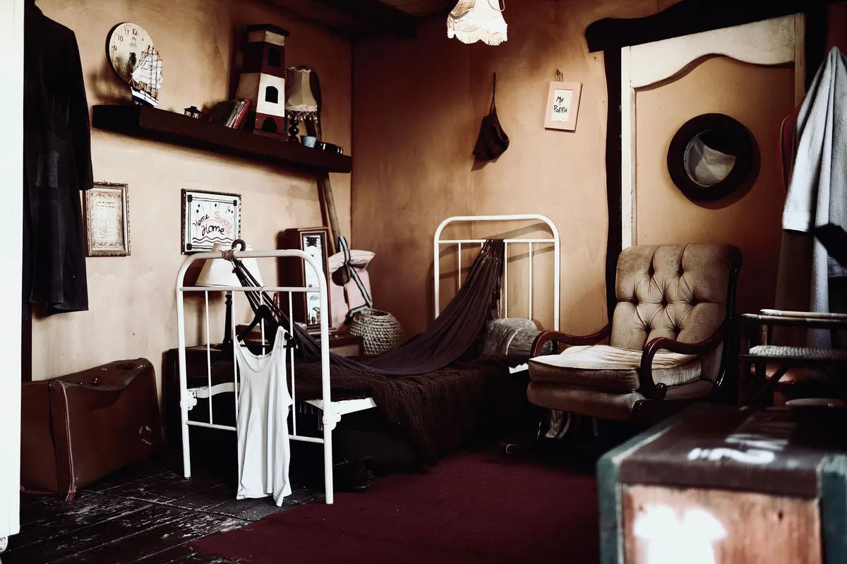 wooden bun feet attached to suitcase bottom cozy bedroom