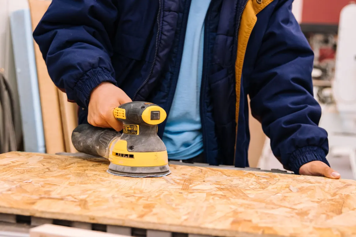 sanding dark stain application wood craft project detail