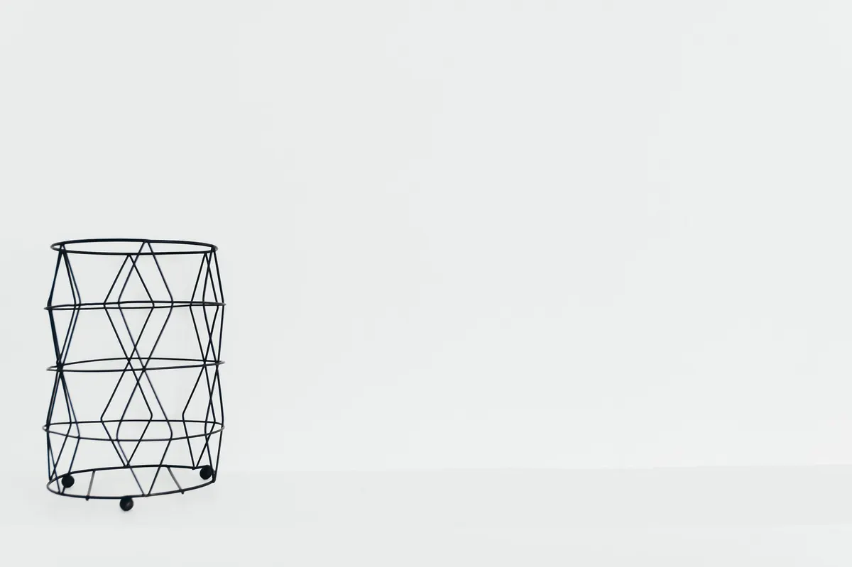 thrifted metal wire basket stand before flip garage studio