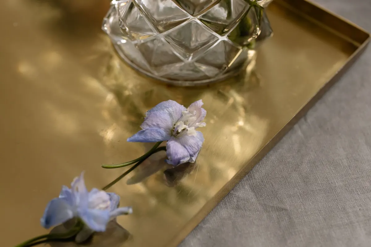 close up metal tray with brass handles vintage style detail