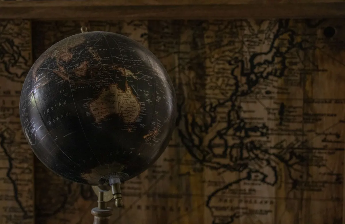 close up of aged globe antique desk decor
