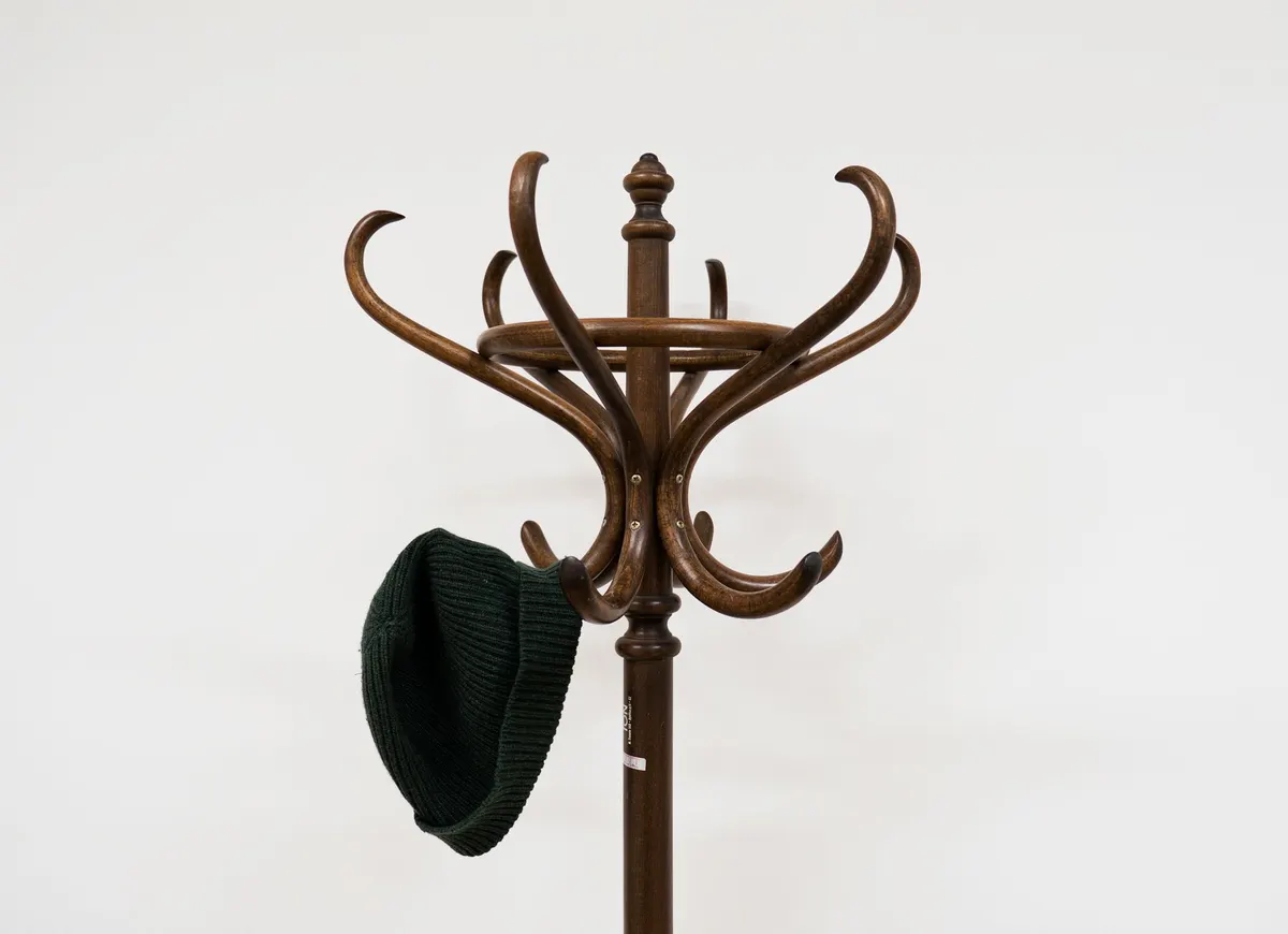 thrifted wooden coat rack entryway